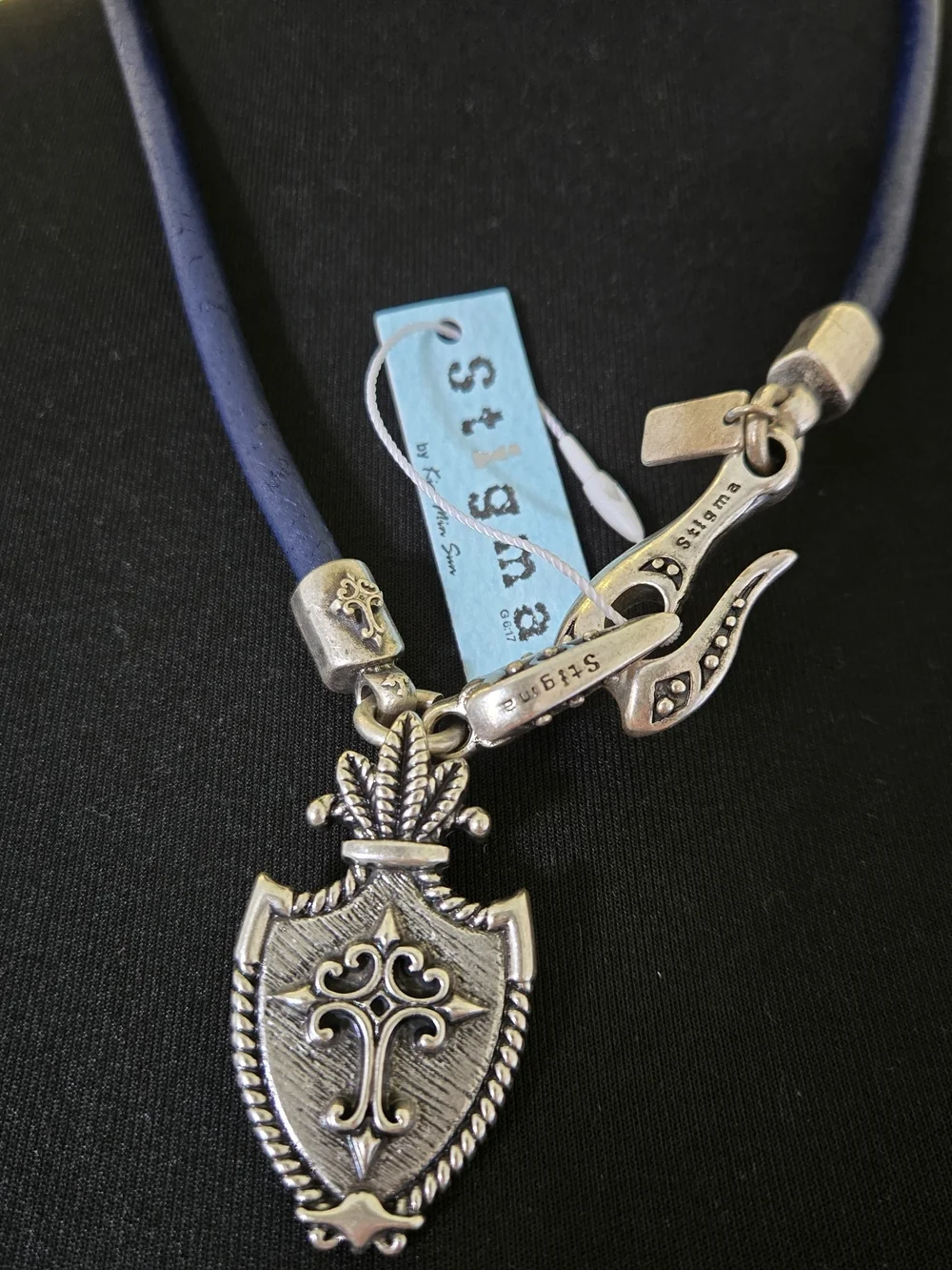 Stigma Navy Cord Necklace with Silver Shield Pendant and Accents